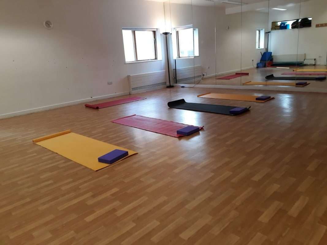 4 yoga mats laid out in the rec club hampstead heath